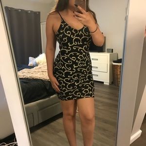 Black dress gold glitter accents